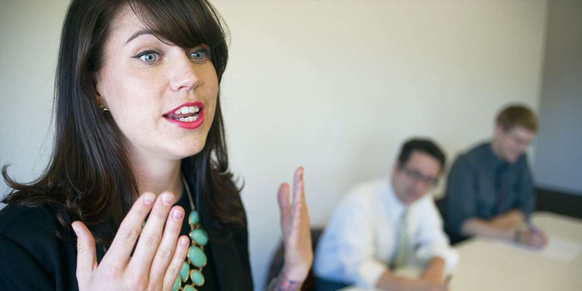 Female debate team member giving a speech